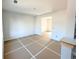 Bright, unfinished living room featuring clean white walls and abundant natural light, awaiting your personal touch at 66 Pine Creek Ct, Dallas, GA 30157