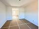 Bright, unfinished living room featuring clean white walls and abundant natural light, awaiting your personal touch at 66 Pine Creek Ct, Dallas, GA 30157