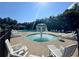 Community pool and mushroom fountain provide a fun and relaxing recreational space at 66 Pine Creek Ct, Dallas, GA 30157