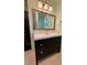 Bathroom vanity with drawers and mirror at 1504 Sycamore Nw Dr, Kennesaw, GA 30152
