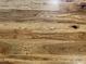 Close up of beautiful dark hardwood flooring featuring natural grains and textures at 1504 Sycamore Nw Dr, Kennesaw, GA 30152
