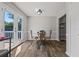 Dining area with French doors and wood-look flooring at 28 Fawn Ct, Sharpsburg, GA 30277