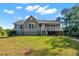 Charming home with a well-manicured lawn and inviting front porch at 28 Fawn Ct, Sharpsburg, GA 30277