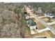 A beautiful aerial view of a residential neighborhood with tree-lined streets and well-maintained homes at 764 Whitby Dr, Douglasville, GA 30134