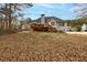 Spacious backyard with a wooden deck, perfect for outdoor gatherings at 764 Whitby Dr, Douglasville, GA 30134