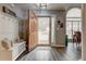 Bright foyer with an open door and stylish decor at 764 Whitby Dr, Douglasville, GA 30134