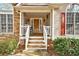 Inviting front porch features a seating area and decorative accents at 764 Whitby Dr, Douglasville, GA 30134