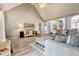 Inviting living room features a cozy fireplace and comfortable seating at 764 Whitby Dr, Douglasville, GA 30134