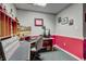 This office has a desk, chair, and other decor at 764 Whitby Dr, Douglasville, GA 30134