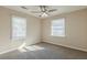 Cozy bedroom with natural light and neutral carpeting at 858 Commodore Nw Dr, Atlanta, GA 30318