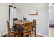 Cozy dining area featuring a round wood table with seating for four at 105 Huskins Rd, Canton, GA 30115