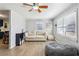 Cozy living room is enhanced by natural light, modern flooring, and a neutral color palette at 105 Huskins Rd, Canton, GA 30115