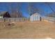 Fenced backyard with a storage shed providing ample space at 1270 Platinum Dr, Hoschton, GA 30548