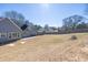 Large fenced backyard with a patio area, perfect for entertaining or relaxation at 1270 Platinum Dr, Hoschton, GA 30548