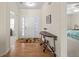 Foyer view with hardwood flooring and a decorative console table at 1270 Platinum Dr, Hoschton, GA 30548