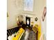 View of the bright and airy foyer featuring a decorative chandelier at 4665 Guilford Forest Sw Dr, Atlanta, GA 30331