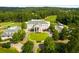 Aerial view of a stately property with a grand entrance and lush surroundings at 47 Cuthbert Ln Ne, Acworth, GA 30101