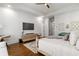 Bedroom with dark hardwood floors and white trim, with white walls and modern decor at 47 Cuthbert Ln Ne, Acworth, GA 30101