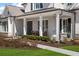 Relaxing front porch with comfortable seating, perfect for enjoying the outdoors at 47 Cuthbert Ln Ne, Acworth, GA 30101