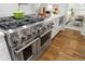 Modern kitchen featuring stainless steel range with countertop at 47 Cuthbert Ln Ne, Acworth, GA 30101