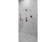 Close up of a beautifully tiled shower with bronze shower head and attachments at 47 Cuthbert Ln Ne, Acworth, GA 30101