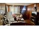Cozy living room with wood paneling and comfortable seating at 2956 Cruse Rd, Lawrenceville, GA 30044