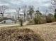 Expansive lot view showcases the property's potential and peaceful surroundings at 2956 Cruse Rd, Lawrenceville, GA 30044