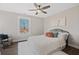 Bright bedroom with natural light, ceiling fan, and comfortable decor at 1686 Terry Mill Se Rd, Atlanta, GA 30316