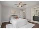 Comfortable bedroom with natural light, ceiling fan, and en suite bath at 1686 Terry Mill Se Rd, Atlanta, GA 30316