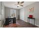 Versatile room with a desk, closet, and decor that can serve as an office or bedroom at 1686 Terry Mill Se Rd, Atlanta, GA 30316