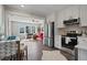 Open-concept kitchen overlooking a cozy living room at 1686 Terry Mill Se Rd, Atlanta, GA 30316