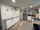 Modern kitchen with stainless steel appliances, granite countertops, and textured white wall at 280 Spellman Nw St, Atlanta, GA 30314