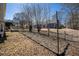 Side yard with a fenced garden and view of the neighbor's residence at 3423 Conley Downs Dr, Powder Springs, GA 30127