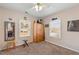 Bedroom with two windows, closet, and small table and stool at 842 Third St, Stone Mountain, GA 30083