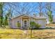 Charming bungalow with a cozy front porch and well-maintained landscaping at 842 Third St, Stone Mountain, GA 30083