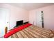 Cozy pink bedroom with closet and two entry doors at 1009 S Creek Dr, Villa Rica, GA 30180