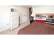 Bedroom featuring a white dresser and adjacent doors at 1009 S Creek Dr, Villa Rica, GA 30180