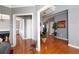 Bright foyer with gleaming hardwood floors, adjacent to game room and hallway at 1009 S Creek Dr, Villa Rica, GA 30180