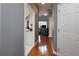 Hallway view showcases open sight lines into the kitchen and living room at 1009 S Creek Dr, Villa Rica, GA 30180