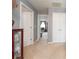 Hallway featuring neutral carpet with access to bedrooms, closets, and other living spaces at 1009 S Creek Dr, Villa Rica, GA 30180