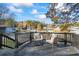 Wooden deck featuring black railing and lounge chairs at 3798 Valley Brook Rd, Snellville, GA 30039