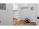 Convenient space with storage cabinets and a pet area, adding functionality and charm to the home at 3798 Valley Brook Rd, Snellville, GA 30039