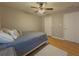 Bright guest bedroom with natural light and a cozy bed at 815 Lake Stone Lea Dr, Oxford, GA 30054