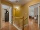 Open hallway leading to bedrooms at 815 Lake Stone Lea Dr, Oxford, GA 30054