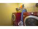 A laundry room featuring modern washer and dryer at 815 Lake Stone Lea Dr, Oxford, GA 30054