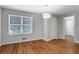 Bedroom featuring hardwood floors, natural light, and neutral walls at 819 Forrest Se Cir, Atlanta, GA 30354