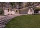 Charming single-story home with a well-manicured lawn and painted white brick exterior at 819 Forrest Se Cir, Atlanta, GA 30354