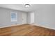 Spacious living room with hardwood floors, neutral paint, and ample natural light at 819 Forrest Se Cir, Atlanta, GA 30354