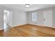 Living room features hardwood floors, neutral walls, and natural light at 819 Forrest Se Cir, Atlanta, GA 30354