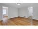 Spacious living room with hardwood floors, neutral paint, and ample natural light at 819 Forrest Se Cir, Atlanta, GA 30354